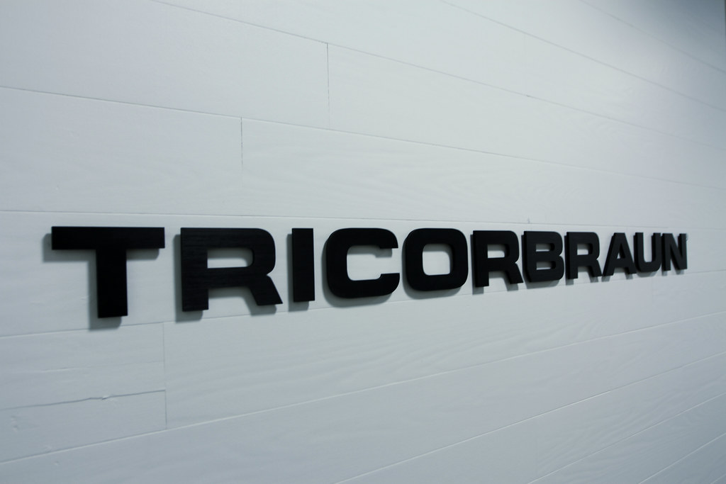 60" wide Black Anodized Brushed Aluminum logo letters for packaging company interior office and production entrance signage St. Louis MO