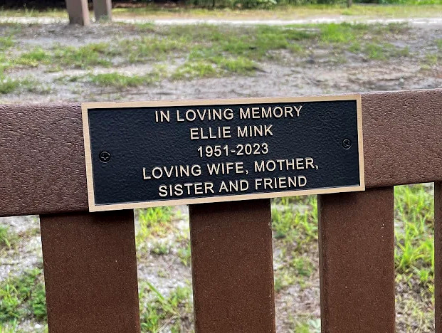 8"w x 2.9"h bronze bench plaque with Satin finish raised lettering and border Recessed paintfilled background in Dark Oxide Leatherette screws through face for customer mounting exterior use