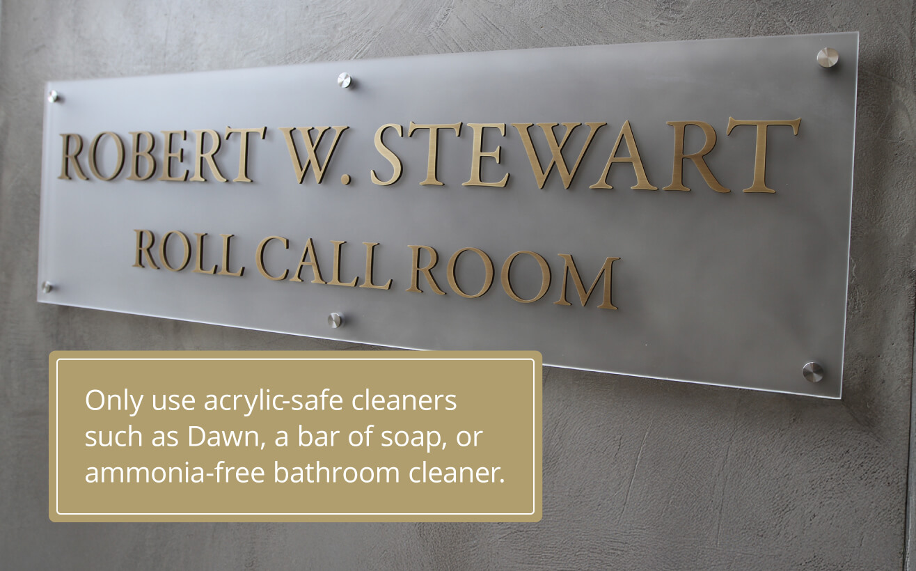 An interior acrylic sign with a tip to only use acrylic-safe cleaners to clean your acrylic sign.