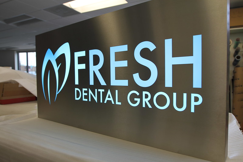 Backlit panel sign for dental business