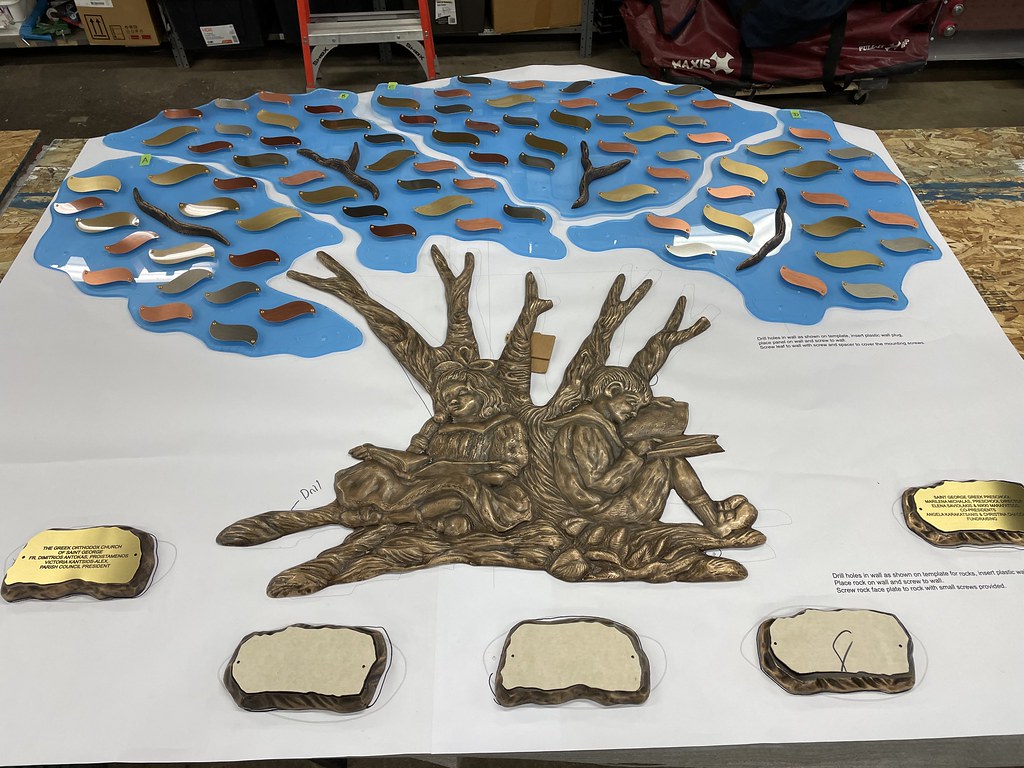 Bronze donor tree with name plates and sculpted bronze base