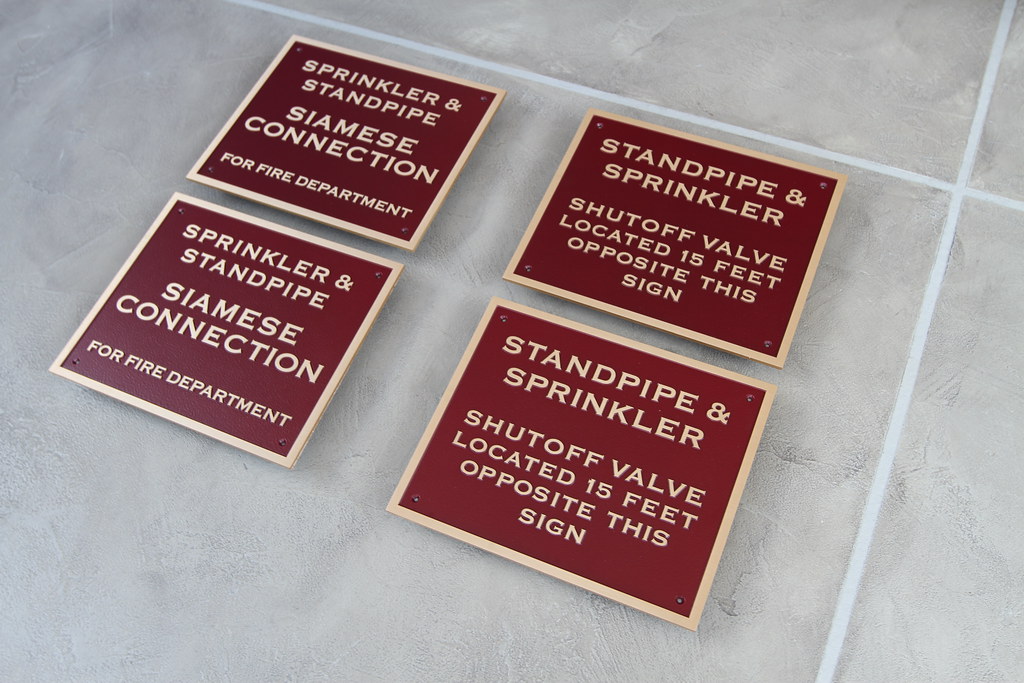 Bronze plaque with Dark Red paint fill for Firehouse