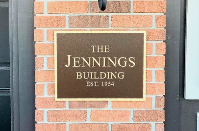 Custom bronze plaque created with Impact Signs