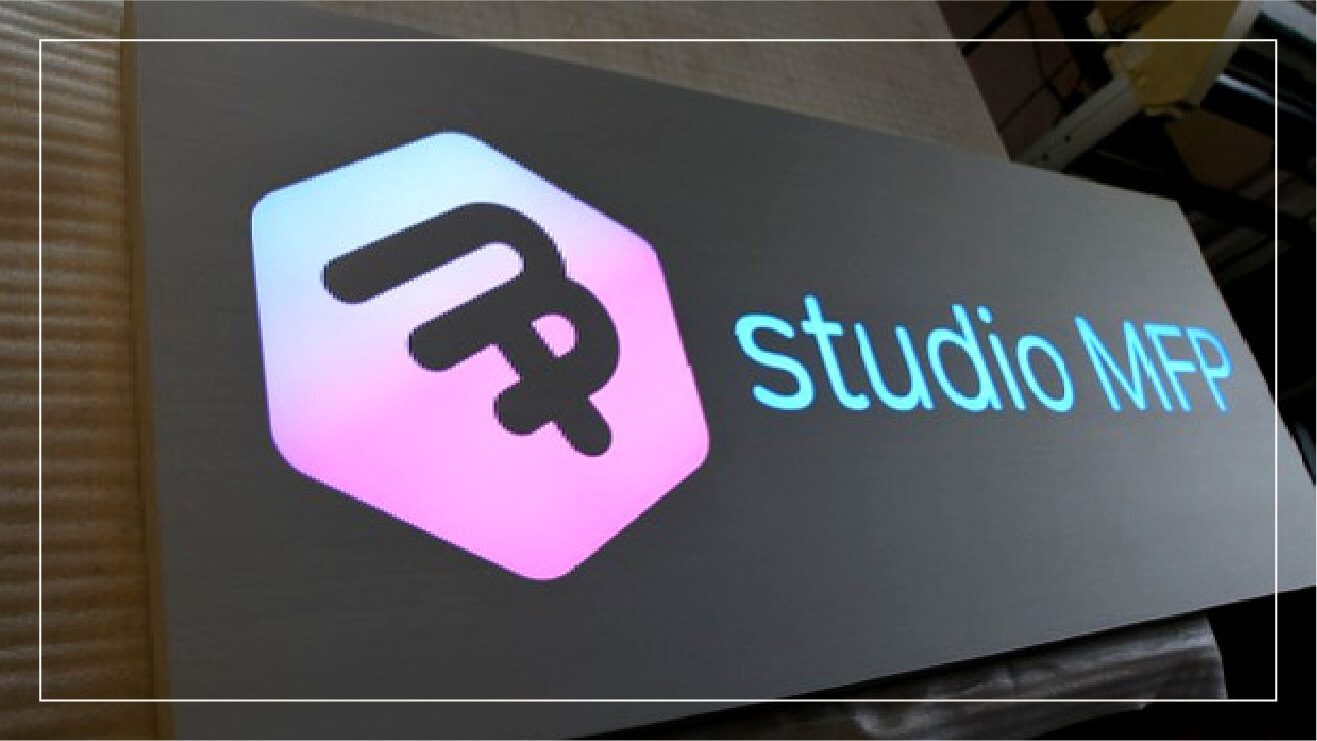 Example illuminated panel business sign.