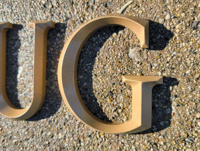 Cast Bronze Prismatic letters (bead blasted finish standard)