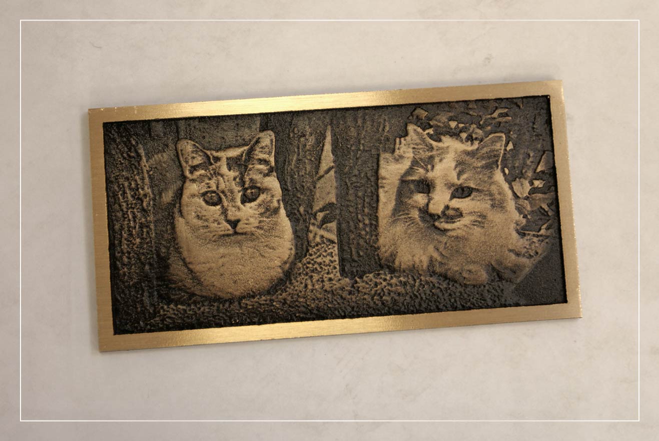 A bas relief plaque memorializing a cat.