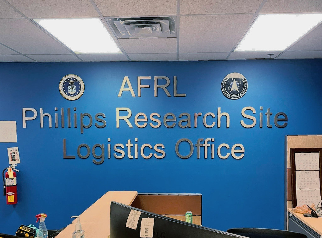 Cut Stainless Steel lettering Arial Font interior drywall lobby