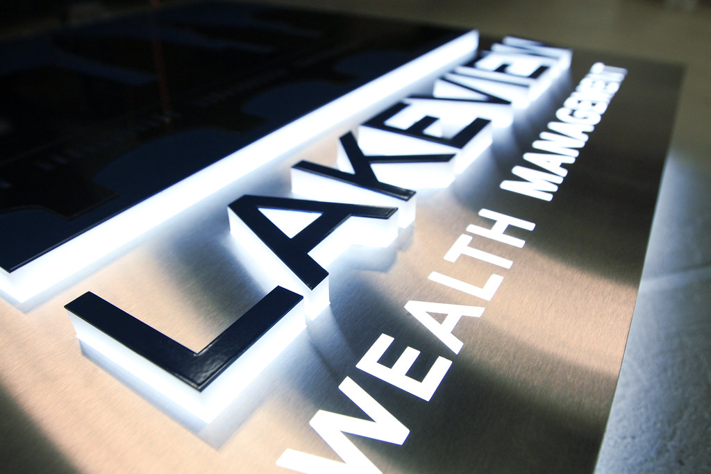 Detail of pushthru lettering with cutthrough lighted lettering.