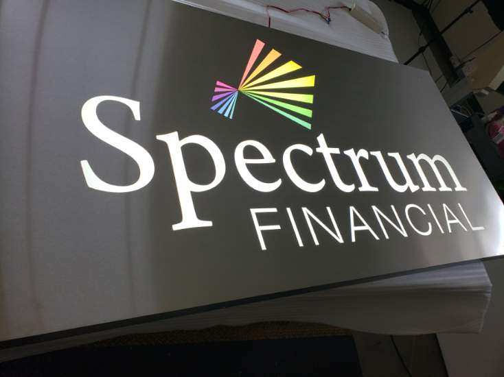 Fabricated panel sign with cut out accent lighted letters
