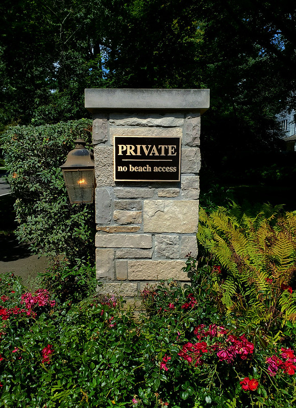 Bronze plaque used as a neighborhood sign