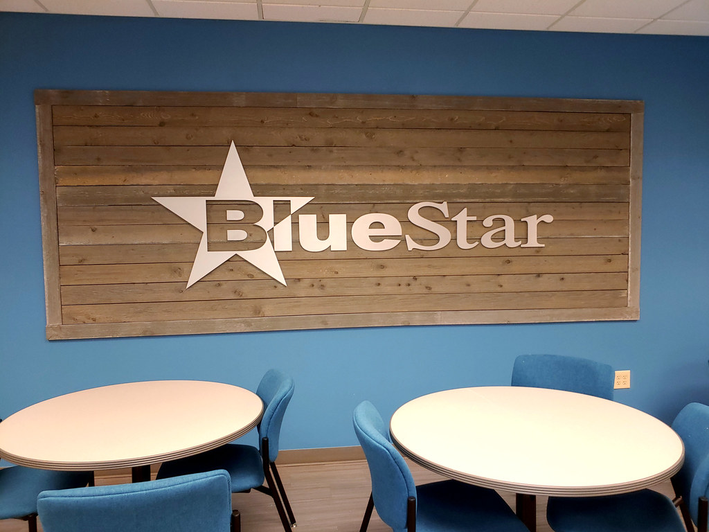 Overall 101" wide 1/4" thick solid Brushed aluminum logo and lettering Installed on Reclaimed Wood sign panel