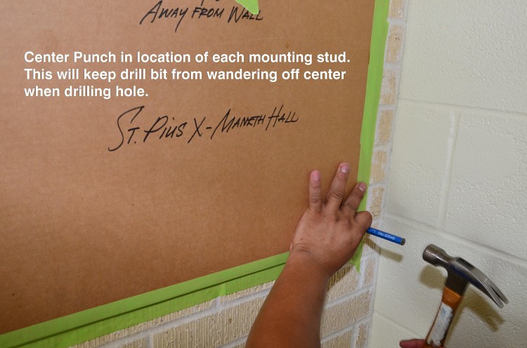 Center punch holes for each stud’s location