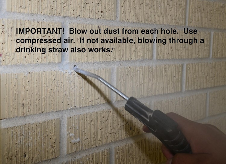 Blow out dust from holes using compressed air