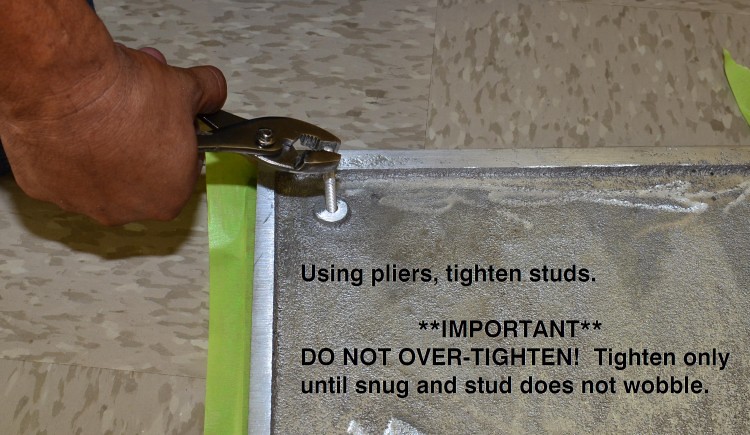 Tighten the studs snugly using pliers
